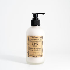 Bottle of Adirondack Fragrance Farm lotion with pump on a white background