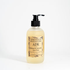 Bottle of Adirondack Fragrance Farm body wash on a white background