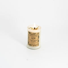 Candle with a label on a white background