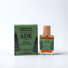 ADK White Pine Artisan Perfume bottle and packaging on a white background