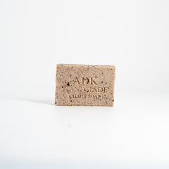 Bar of soap with 'ADK Handmade Chaga Soap' text on a white background