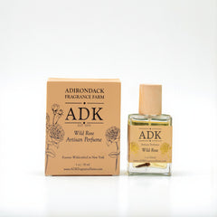 ADK Wild Rose Artisan Perfume bottle and packaging on a white background