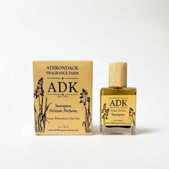 ADK Sweetgrass Artisan Perfume bottle and packaging on a white background