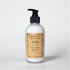 Body lotion bottle with a label on a white background