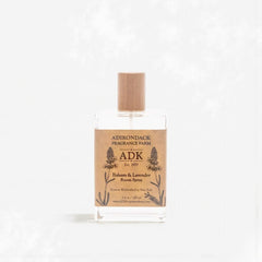 ADK room spray bottle with cardboard label on a white background